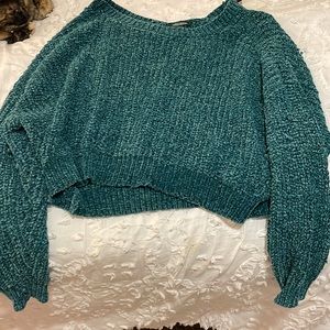Cropped target sweater